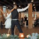 Nix finishes her first dance with her husband in front of a crowd